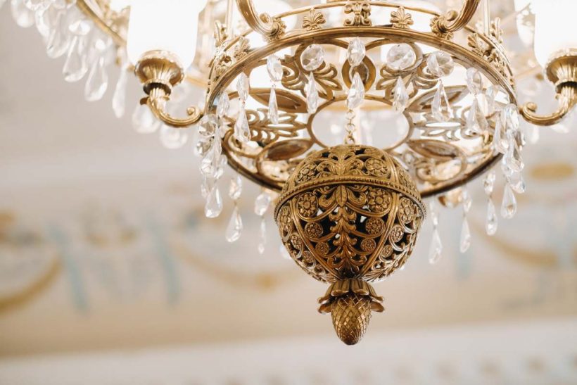 Antique crystal chandelier chandelier in the palace. Large chandelier in the castle.