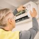 Maintenance, installation and back of a man with air conditioner for service and ac repair. Buildin.