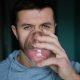 Man drinks water, Close-up shot of bearded man drinking fresh clean water from glass, Quenching thirst, Lifestyle healthcare concept